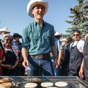 Trudeau, Poilievre attend Calgary Stampede pancake breakfast