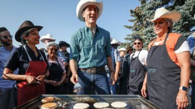 Trudeau, Poilievre attend Calgary Stampede pancake breakfast