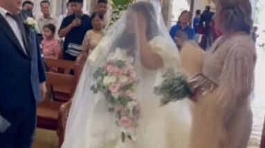 Bride walks down aisle at flooded church in the Philippines | Typhoon Doksuri