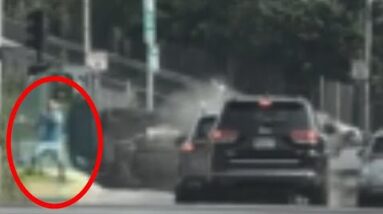 Pedestrian narrowly avoids being hit by airborne SUV in Boston | CAUGHT ON CAM