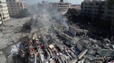 Drone video of flattened buildings and debris in Gaza
