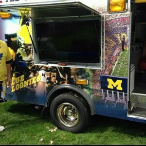 'Blue Loonies' take on Rose Bowl | Canadian revamps ambulance into tailgating bus