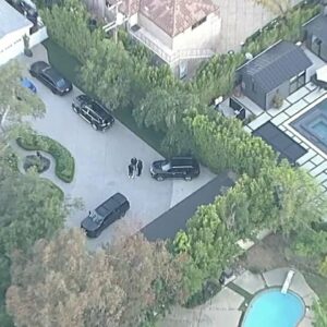 Guard shot outside mansion owned by manager of The Weekend