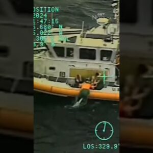 WATCH: Man rescued from sinking boat